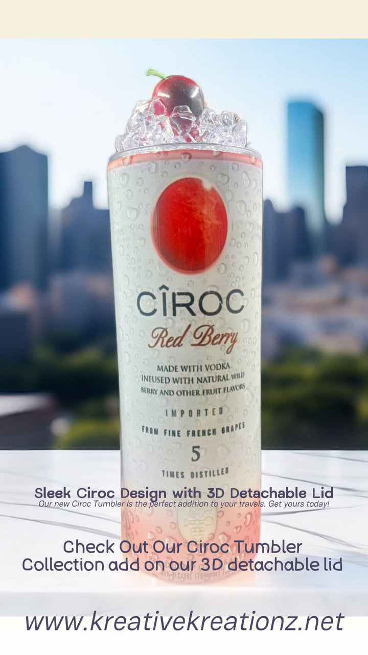 Two cans of Kreative Kreationz Ciroc 20oz Tumbler with 3D Lid Topper are shown on a wooden surface, reminiscent of travel tumblers. The left can is Red Berry flavor, topped with ice and a cherry. The right can is Vodka Snap Frost flavor, topped with ice and a lemon slice. Both cans feature product information and branding.