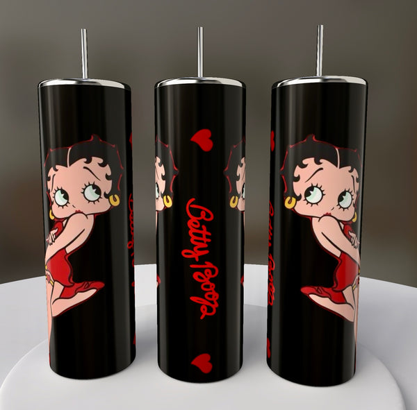 Three tall, cylindrical Betty B White 20 oz Skinny Tumblers by Kreative Kreationz feature a black backdrop with Betty Boop in a red dress and heels. The design pops with "Betty Boop" in red and small hearts, complete with lids and vibrant sublimated graphics.