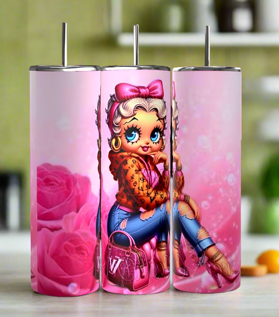 The Betty B Bougie 20oz Skinny Tumbler set by Kreative Kreationz includes three adorable pink tumblers. Each tumbler shows a cute cartoon character in a leopard print jacket with ripped jeans and pink boots, on sparkling backgrounds with pink roses and handbags.