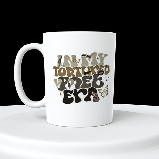 A distinctive design from Kreative Kreationz, the IN MY TTPD ERA Ceramic Mug boasts the text 