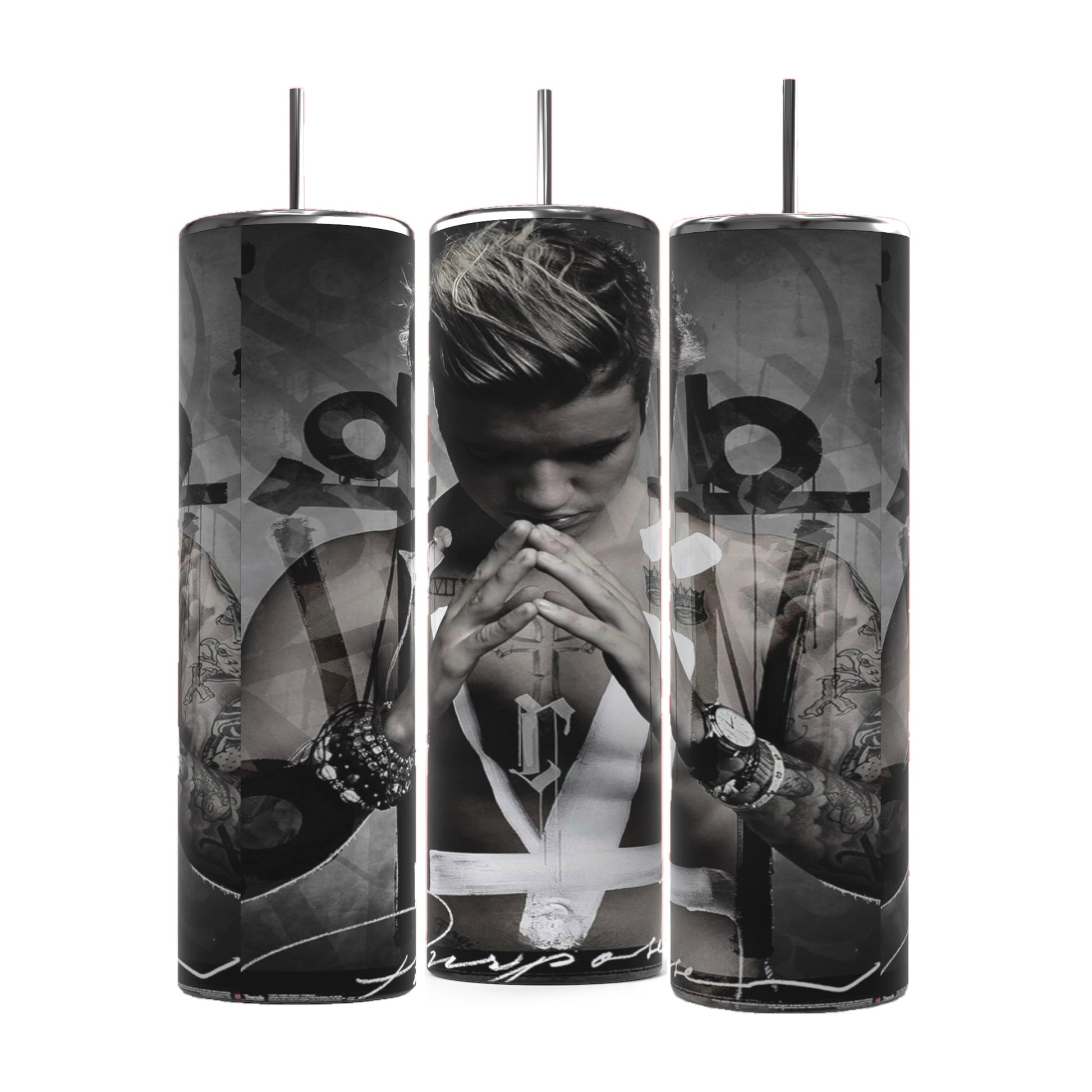 Three cylindrical Justin Bieber Prayer 20oz Tumblers by Kreative Kreationz feature monochrome images of a contemplative Justin Bieber, adorned with tattoos and wearing a sleeveless shirt and several bracelets. His hands are pressed together in a prayer-like gesture, with the word "Purpose" visible at the bottom. These tumblers keep beverages hot or cold.