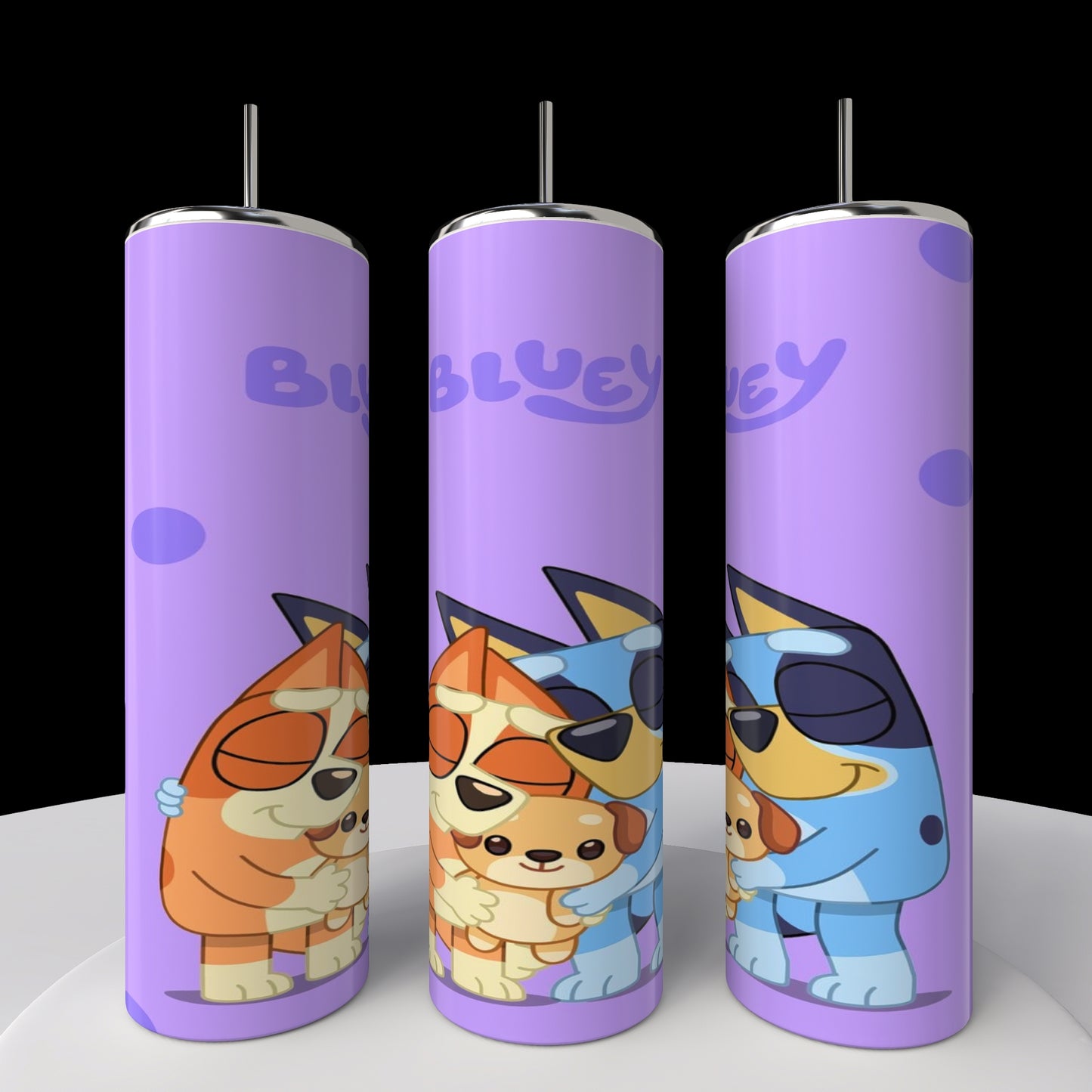 Three tall cylindrical Kreative Kreationz Bluey 20oz stainless steel tumblers with a purple background display playful cartoon dogs hugging, with "Bluey" elegantly written above them, adding charm to the side-by-side arrangement.