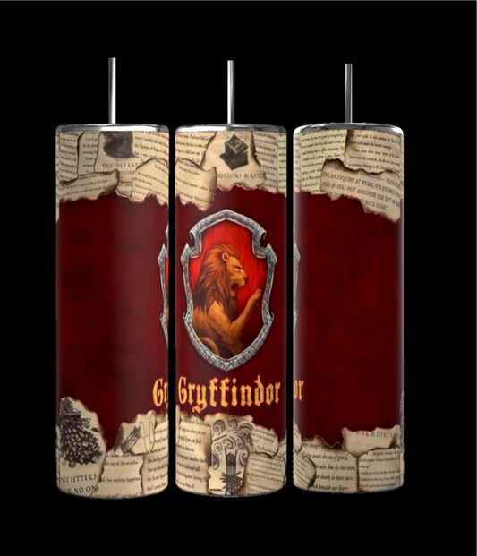 These Harry Potter Collection 20oz Tumblers from Kreative Kreationz feature a tall, cylindrical design with a red Gryffindor crest and lion emblem. The background is adorned with parchment-like patterns and text against a dark backdrop, celebrating the four house designs.