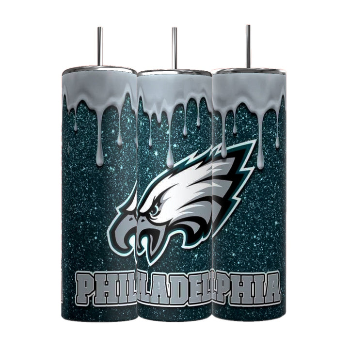 Three Kreative Kreationz 20oz Skinny Tumblers feature a blue glitter background with a stylized Philadelphia Eagles logo and the word "Philadelphia." Each includes a silver dripping design at the top, spill-proof lid, and reusable straw.