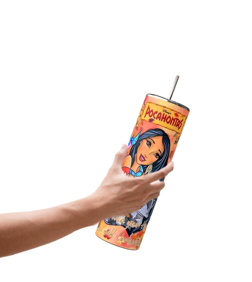 A hand holding a vibrant Pocahontas 20oz Tumbler from Kreative Kreationz showcases the illustrated character in colorful detail. Decorative patterns surround Pocahontas, creating an eye-catching design on this tumbler with a spill-proof lid.