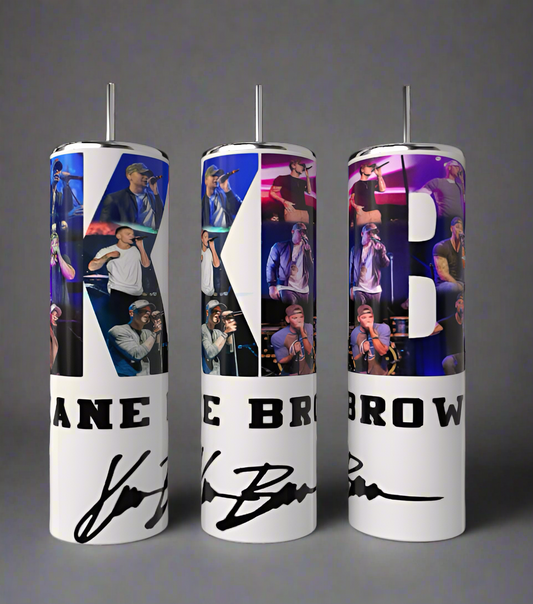 The Kane Brown 20oz Tumbler by Kreative Kreationz showcases sublimated photo collages of the singer on stage, featuring the letters "K" and "B," his name, and signature. This stylish drinkware is perfect for fans wanting to celebrate their favorite artist.