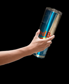 A hand holding a large Red Bull can against a plain black background evokes the sleek design of the Kreative Kreationz Red Bull Sugar Free Silver Stainless Steel 20oz Tumbler. The smooth lines suggest durability, featuring a spill-proof lid, promising an uninterrupted energy boost for any adventure.