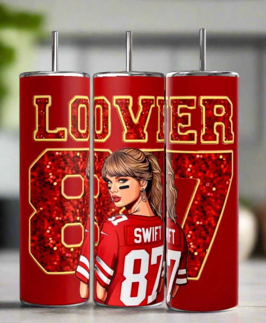 Three tall red tumblers from Kreative Kreationz, named "Taylor Swift | Lover 87 Tumbler," display the word "LOVER" and the number "87." The middle stainless steel tumbler features a cartoon woman in a sports jersey marked "SWIFT 87," merging style with eco-friendly drinkware.