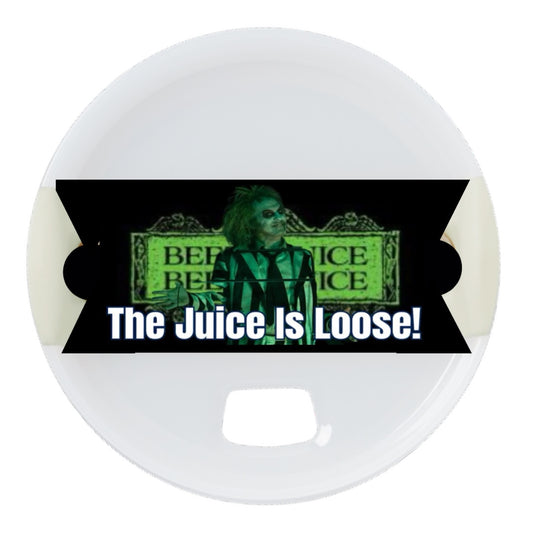 A character in green lighting, wearing a black and white striped suit, stands before a sign with repeated text. Overlain with "The Juice Is Loose!", it's as bold as the Beetlejuice Stanley Lid Topper by Kreative Kreationz—striking and unforgettable.