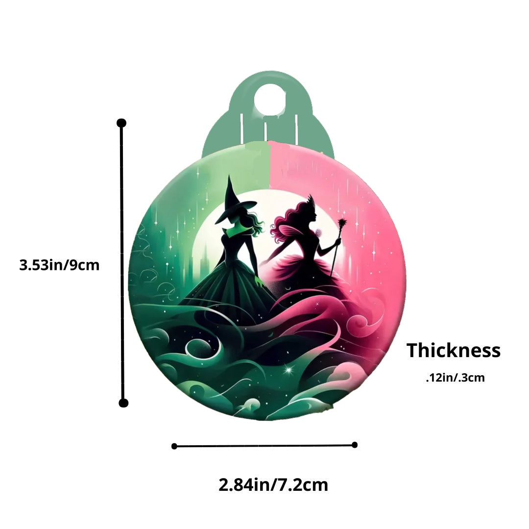 The Kreative Kreationz Wicked Christmas Tree Ornament boasts a sublimated design showcasing two silhouetted figures in green and pink costumes, set against a swirling backdrop. Ideal for holiday decor, these figures face opposite directions. It measures 3.53 inches (9 cm) in height, 2.84 inches (7.2 cm) in width, and 0.12 inches (3 mm) in thickness.