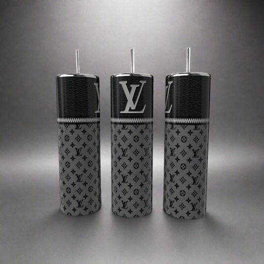 Displayed on a gray background, the LV 20oz Skinny Tumblers by Kreative Kreationz feature silver lids and straws. Each tumbler has a black and gray monogram "LV" pattern with double-wall insulation to maintain beverage temperature.