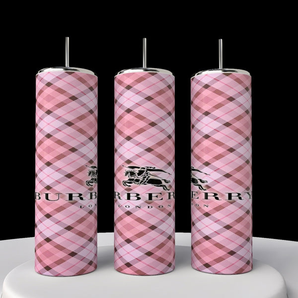 Three Burberry 20oz Skinny Tumblers by Kreative Kreationz, featuring pink plaid patterns and silver tops, display a horse and knight logo against a black background.