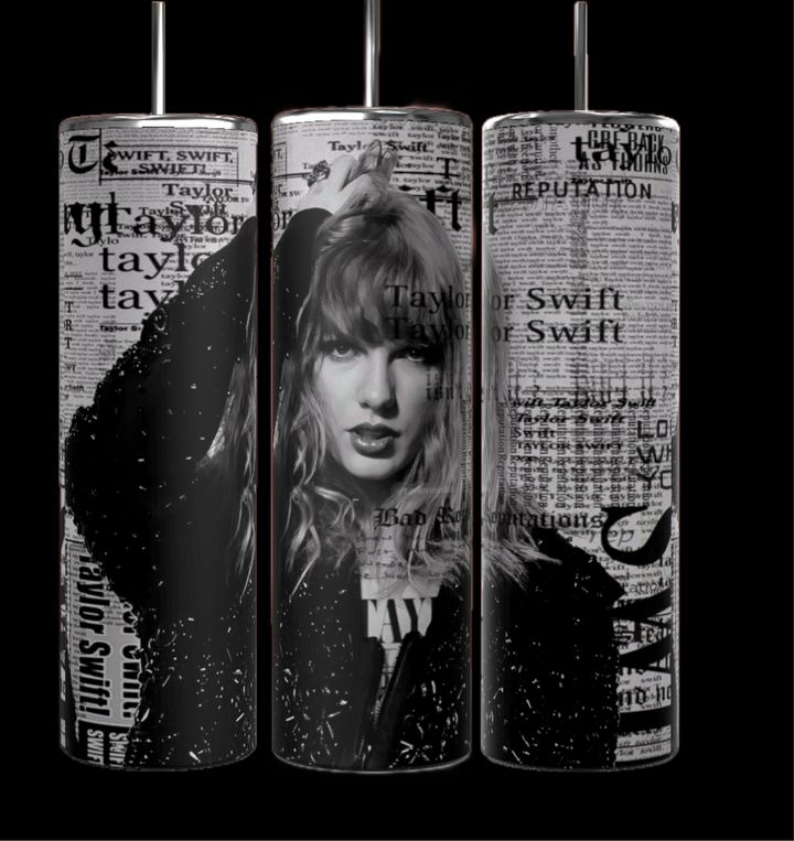 Three Taylor Swift Reputation Newspaper 20oz Tumblers from Kreative Kreationz feature a black-and-white image of a woman with wavy hair and a newsprint-style background. The central tumbler depicts the woman posing with one hand in her hair, accompanied by "Taylor," "Swift," and "Reputation" text. These tumblers are designed with durable construction and spill-proof lids.