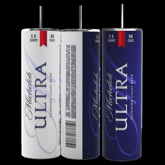 Three Michelob Ultra beer cans are displayed: one with a white background, another showcasing a barcode, nutritional data, and text, and the third boasting a dark blue background. Nearby is a sleek 20 oz stainless steel skinny tumbler from Kreative Kreationz featuring the Michelob Ultra logo. The labels on the cans indicate the beer contains 2.6 grams of carbs and 96 calories.