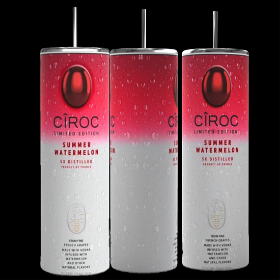 Two cans of Kreative Kreationz Ciroc 20oz Tumbler with 3D Lid Topper are shown on a wooden surface, reminiscent of travel tumblers. The left can is Red Berry flavor, topped with ice and a cherry. The right can is Vodka Snap Frost flavor, topped with ice and a lemon slice. Both cans feature product information and branding.