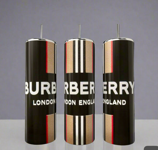 Three sleek Burberry 20oz Skinny Tumblers by Kreative Kreationz showcase timeless style with bold black, beige, white, and red stripes. Each comes with a metallic straw and displays 