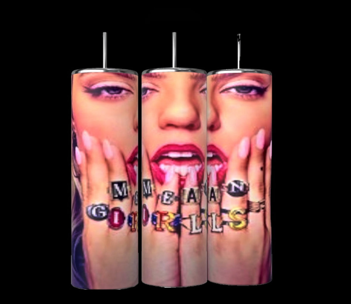 Introducing the Mean Girls 20oz Tumbler by Kreative Kreationz: a set of three cylindrical tumblers featuring an artistic depiction of a woman's face with lips poised and adorned with painted nails. The text "Mean Girls" is artfully arranged on her fingers in vibrant blocks, all set against a sleek black background. Each tumbler comes with spill-proof lids, making them ideal for any beverage.