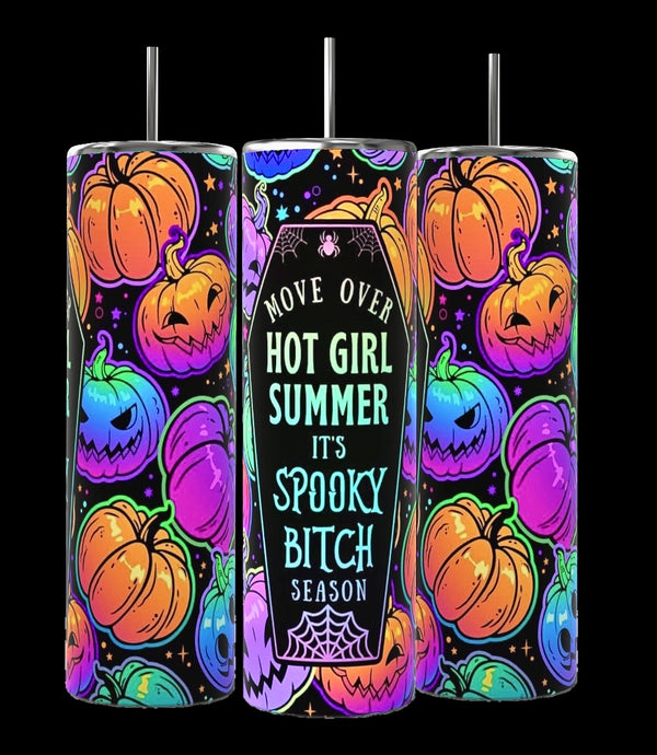 The Spooky Bitch Season Series by Kreative Kreationz is a set of three colorful 20oz tumblers featuring vibrant designs of various jack-o'-lanterns in orange, blue, and purple against a black background. The central Halloween drinkware tumbler has a coffin-shaped design with the text "Move over hot girl summer, it’s spooky bitch season.