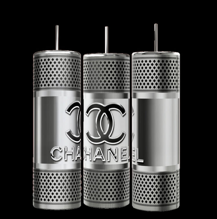 Three metallic perfume bottles, inspired by Chanel's design, prominently display interlocking "C" logos and the word "CHANNEL" across their centers. These sleekly designed bottles feature an industrial look with perforated metallic bands and spill-proof lids, reminiscent of Kreative Kreationz's 20oz Silver Stainless Steel Tumbler.