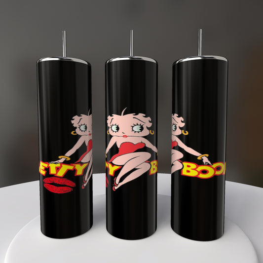 Three Betty B20oz Skinny Tumblers by Kreative Kreationz, featuring black cylinders with silver lids and a cartoon character in a red outfit and red lips, partially read "Boop." They are displayed on a white circular surface against a dark background.