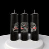 Three slender black Kobra Kai 20oz Stainless Steel Tumblers from Kreative Kreationz are displayed vertically on a circular white platform against a midnight backdrop. Each tumbler resembles spray cans with snake illustrations and red and white text, adding intrigue and elegance.