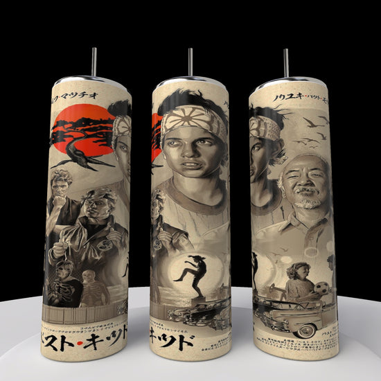 Kreative Kreationz offers a set of three Kobra Kai 20oz Stainless Steel Tumblers with a vintage martial arts theme. Each features characters like a martial artist and mentor, with Japanese and English text, red sun with birds, and beach scenes evoking classic Kobra Kai styles.