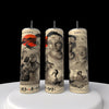 Three cylindrical candles feature vintage-style illustrations of martial artists, a car, and a crane against a sunset backdrop. The art is akin to that on the Kobra Kai 20oz Stainless Steel Tumbler by Kreative Kreationz, with text in Japanese characters.