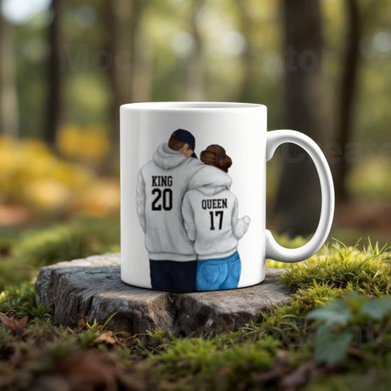 The Couples Ceramic Mug by Kreative Kreationz is a romantic high-quality gift featuring a couple in hoodies labeled 