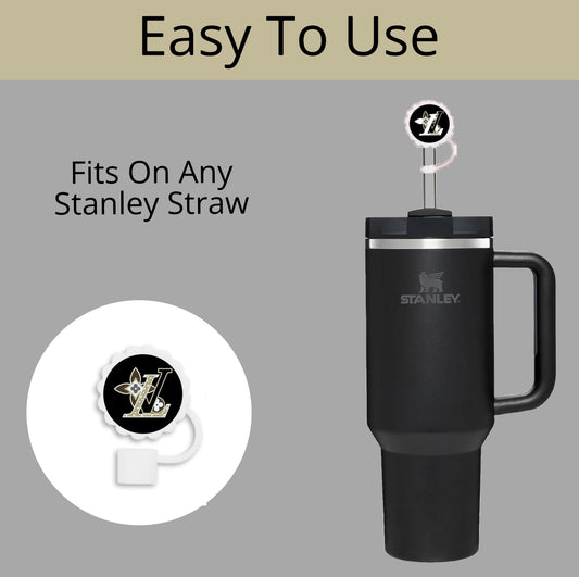 A black Stanley tumbler with a handle is shown, featuring the LV Straw Cover by Kreative Kreationz. The background reads "Easy to Use" and "Fits On Any Stanley Straw," highlighting its compatibility with 40oz, 30oz, and 20oz sizes. The design features the letter "L.