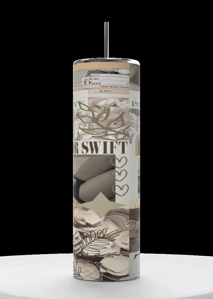 Video of a tall cylinder tumblers going counter clockwise to show all sides of the sublimated image on the tumbler with a picture of Taylor Swift from her new TTPD era, with the words “Taylor swift”, TTPD, “the Tortured Poets Department” written in the image with other key images from the TTPD era