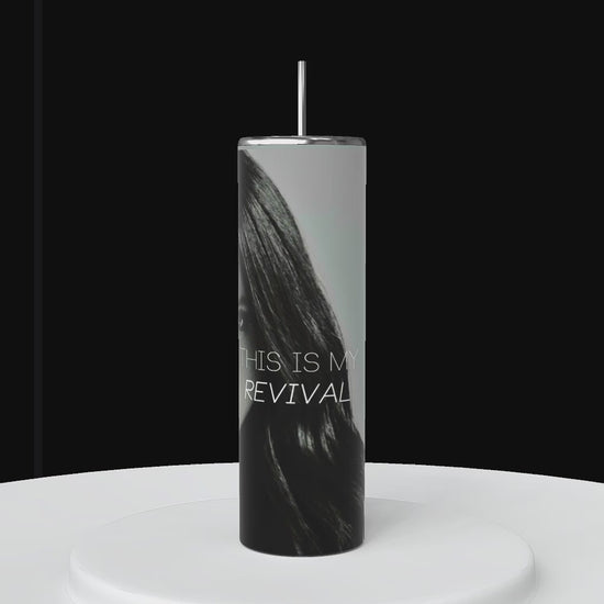 Video of 1 tall, cylindrical personalized tumbler is shown. the wrapped tumbler features the name 